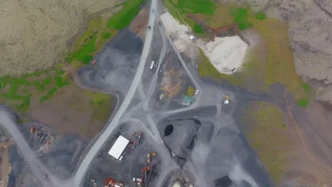 Top Down Flight Over Vatnsskard Quarry Iceland - Heavy Truck Access Road Video stock 345774254