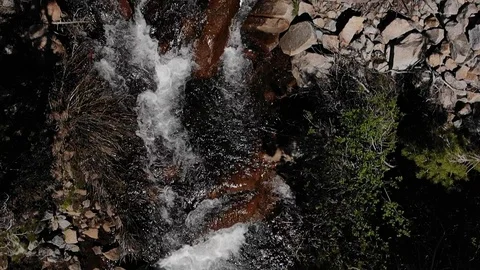 Top Down Fly Over Cascading Creek with Waterfalls - Slow Motion Aerial Drone Stock Footage 111251816