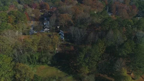 Top down fly over wooded aera with sparse house Stock Footage 170841802
