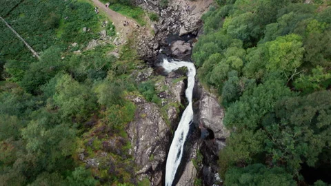 Top-Down Forward Aerial shot of Stunning Waterfall in Aber Falls, Wales Video stock 321132321