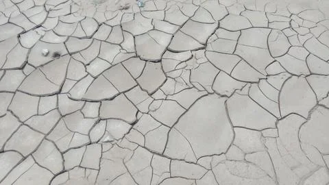 Top Down Full Frame Close Up of Dry Cracked Clay Mud and Drought Pattern Foto stock