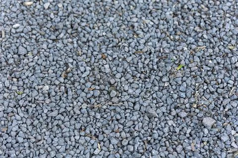 A top-down full-frame shot of small grey gravel. The uniform texture of crush Stock Photos