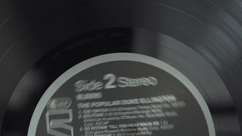 TOP DOWN ON HALF OF A VINYL SPINNING Stock Footage 126236130