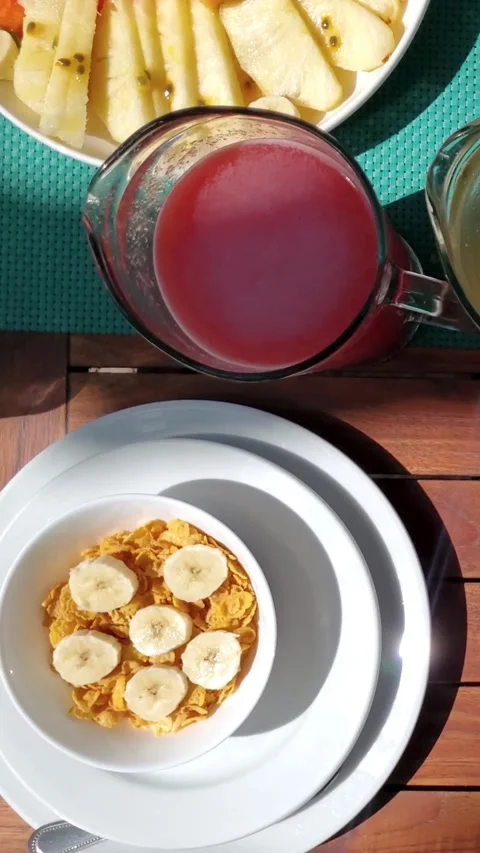 Top down Healthy Breakfast organic food on wooden table with sun rays. Wellness Stock Footage 313104467
