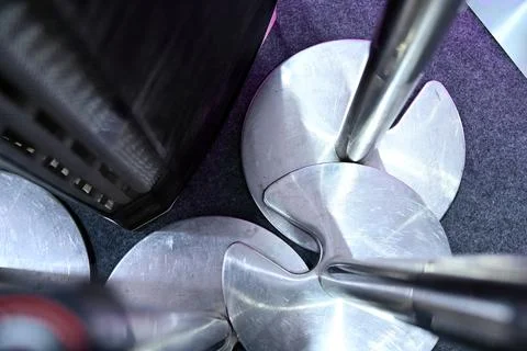 A top-down, high-angle shot looking at the circular metal bases of several .. Stock Photos