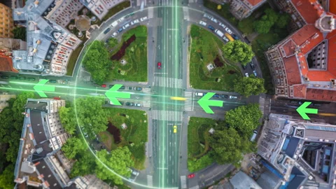 Top down hyperlapse shot of road intersection on round square in city. Visual 스톡 동영상 248543166