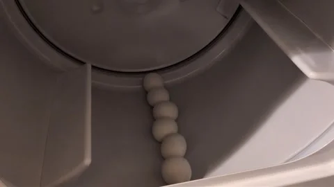 A top-down interior silent video of the inside a modern clothes dryer Stock-Footage 346187539