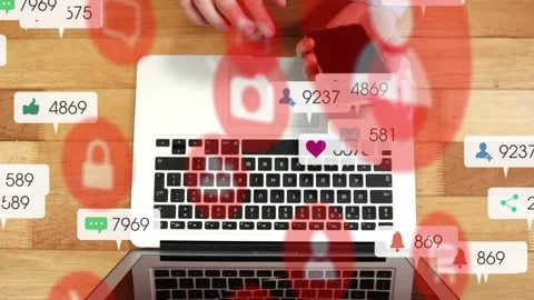Top-down laptop and hands handling pulses from left, tapping and typing while Stock Footage 329576141