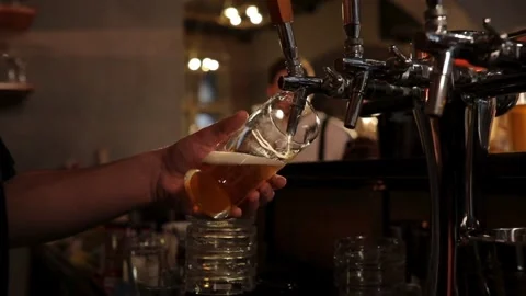 Top-down macro super slow motion studio shot with copy space. pouring a beer Stock Footage 265837043