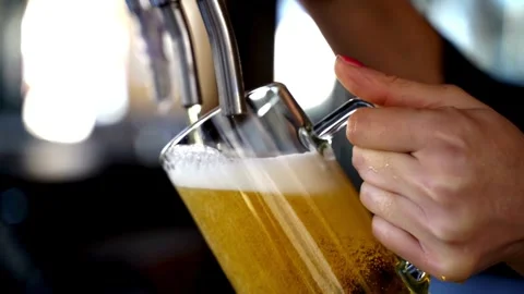 Top-down macro super slow motion studio shot with copy space. pouring a beer Stock Footage 265837798