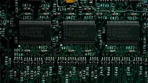 Top down macro view of electronic circuit board with microchips Stock Footage 335118820