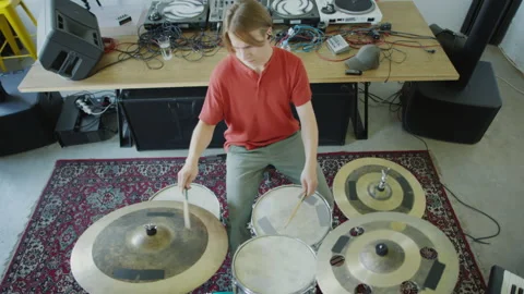 Top Down of Man Playing Drumset Stock Footage 223217125