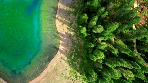 Top down of mountain lake Carezza, Dolomites, Italy Stock Footage 124016630
