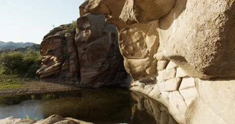 Top-down moving shot. White smooth rocks. Great texture. Clear water. Bayanaul. Stock Footage 142191586