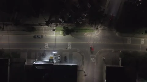 Top down night drone view urban intersection traffic cars city Vídeos de archivo 332408259