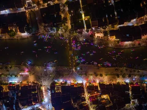 Top-down night view of lantern boats on river in Hoi An Old Town Stock Photos