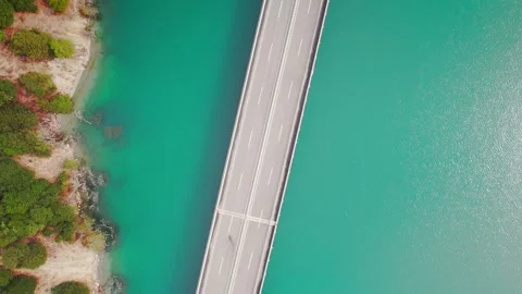 Top down Niyang River bridge over clear green water Stock Footage 345879108