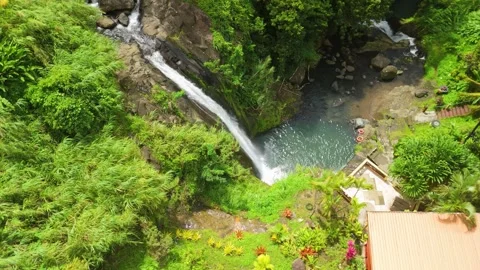 Top Down Orbit Around Concord Falls Waterfall Pool in Grenada Stock Footage 342356107