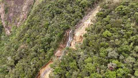 Top-down orbit over mountain waterfall at Khanh Le Pass, Vietnam 動画素材 337400656