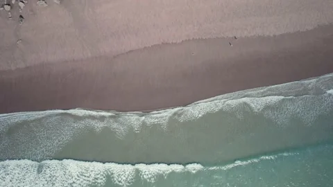 Top Down over the beach and waves at low tide Stock Footage 201731118
