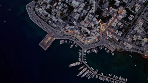 Top down over harbor at nighttime with lights 4K Stock Footage 314753907