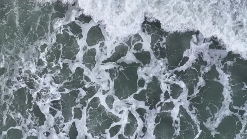 Top Down over Storm Waves in Slow Motion from a drone, Cornwall, UK 動画素材 228513975