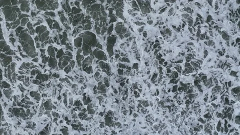 Top Down over Storm Waves in Slow Motion from a drone, Cornwall, UK Stock Footage 228514494
