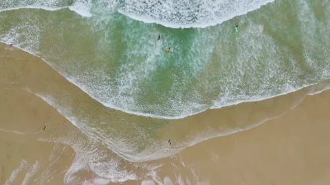 Top Down over surfers and Waves on Contis beach, Saint Julien en Born, France Stockbeeldmateriaal 312292518