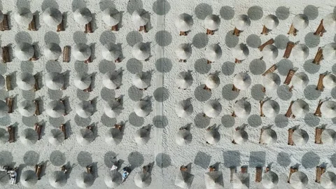 Top Down over Umbrellas and Beach from a drone, Albanian Riviera, Albania Stock-Footage 276139106