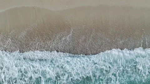Top Down over Waves and Beach in Himare from a drone, Albanian Riviera, Albania Stock Footage 276139146