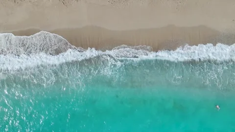 Top Down over Waves and Beach in Himare from a drone, Albanian Riviera, Albania Video stock 276139223