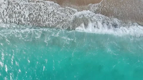Top Down over Waves and Beach in Himare from a drone, Albanian Riviera, Albania Stock Footage 276139225