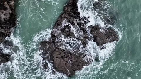 Top Down over Waves at storm in slow motion from a drone, St. Agnes, Cornwall Stock Footage 280090352