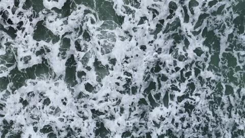 Top Down over Waves at storm in slow motion from a drone, St. Agnes, Cornwall Stock-Footage 280090391