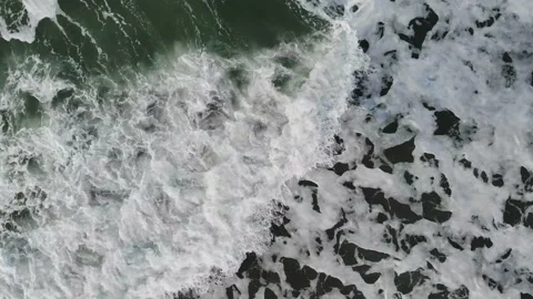 Top Down over waves with swell in Cornwall, UK 4K Stock Footage 134406346