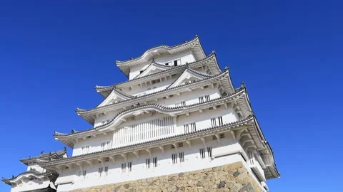 Top down overview of the main white tower in historic Himeji park of Japan, 4k. Stock Footage 136133097