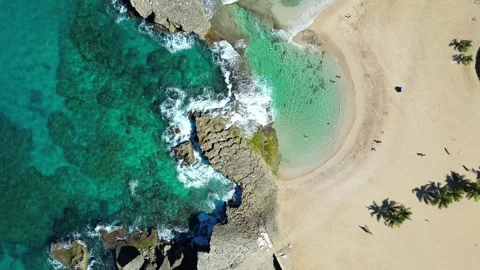 Top Down with Pan of "La Poza" Beach in Arecibo, Puerto Rico Stock Footage 258591830