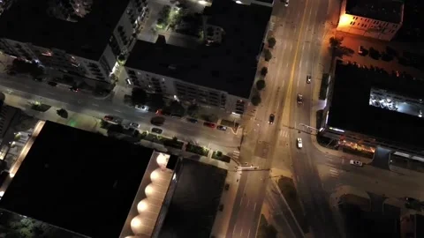 Top-down pan shot of streets in downtown Indianapolis at night Stock Footage 258524321