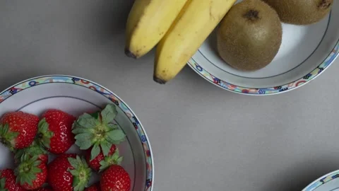 A top down panning shot of the uncut ingridients for a chocolate fondue Stock Footage 346238191