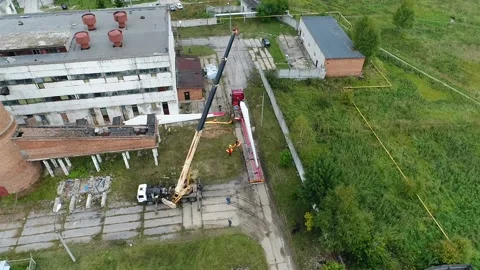 Top-down panorama of unloading huge structural elements. Stock Footage 136883267