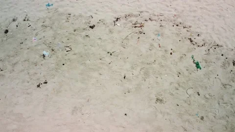 Top down panoramic view of garbage and plastic on the sand in a public beach. Stock Footage 139325602