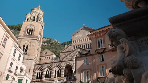 Top-down perspective of Amalfi Cathedral plaza bathed in winter sunlight Stock Footage 325127597