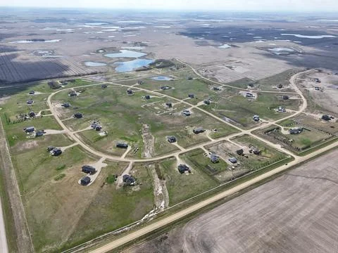 Top-down perspective reveals a planned residential community with curving roa Stock Photos