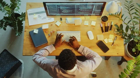 Top Down of Programmer Coding on Computer at Desk in Office Stock Footage 277860718