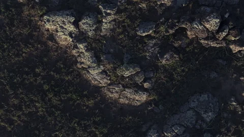 Top Down Pull Back Volcanic Rock Basalt Texture 4K HLG Stock Footage 343800715