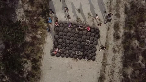 Top-down pull-out and push-in aerial drone shot of summer camp obstacles Stockbeeldmateriaal 157313160