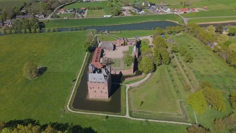 Top down pullback reveal of Doornenburg Castle and countryside Stock Footage 334319360