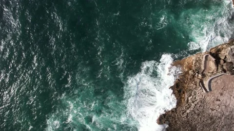 Top down reveal of Boca do Inferno, Hell's mouth cliff in Cascais, Portugal Stock Footage 220867795