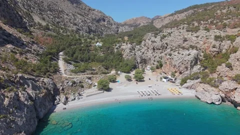 Top-Down Rising Drone Shot of Achata Beach from the Sea – Karpathos Stock-Footage 321650157