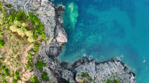 Top Down Rocky Coast and Sea Cave Greece Stock Footage 336839598